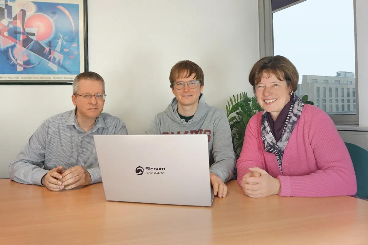 Signum Team-Mitglieder beim Meeting